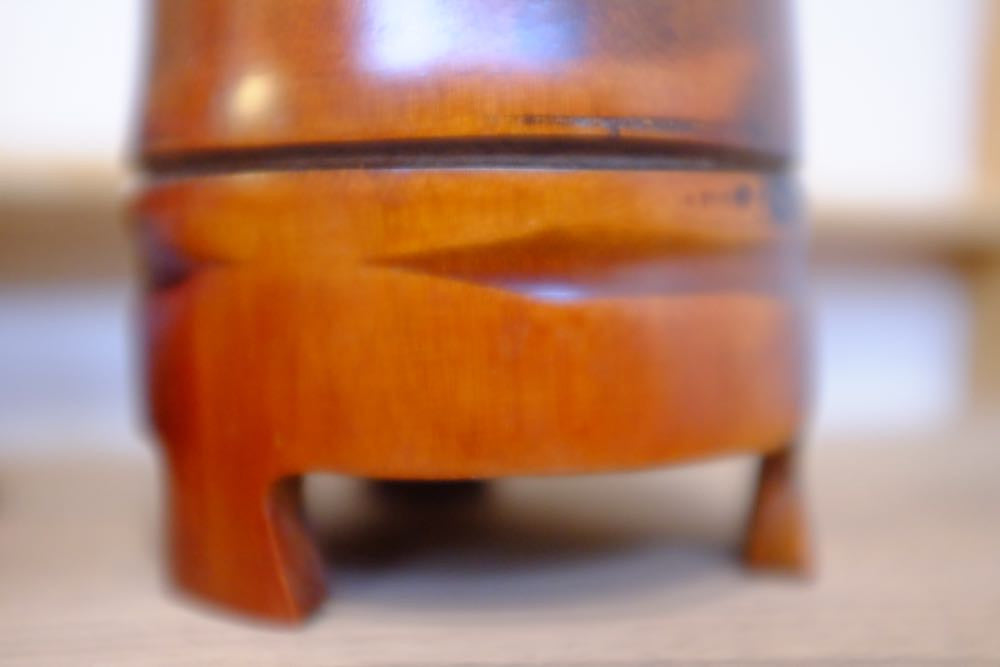 Bamboo vase and handmade drawing accessories for artistic enthusiasts.
