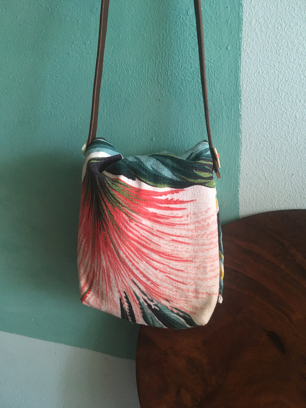 Tropical style banana leaf shoulder bag with upcycled materials.
