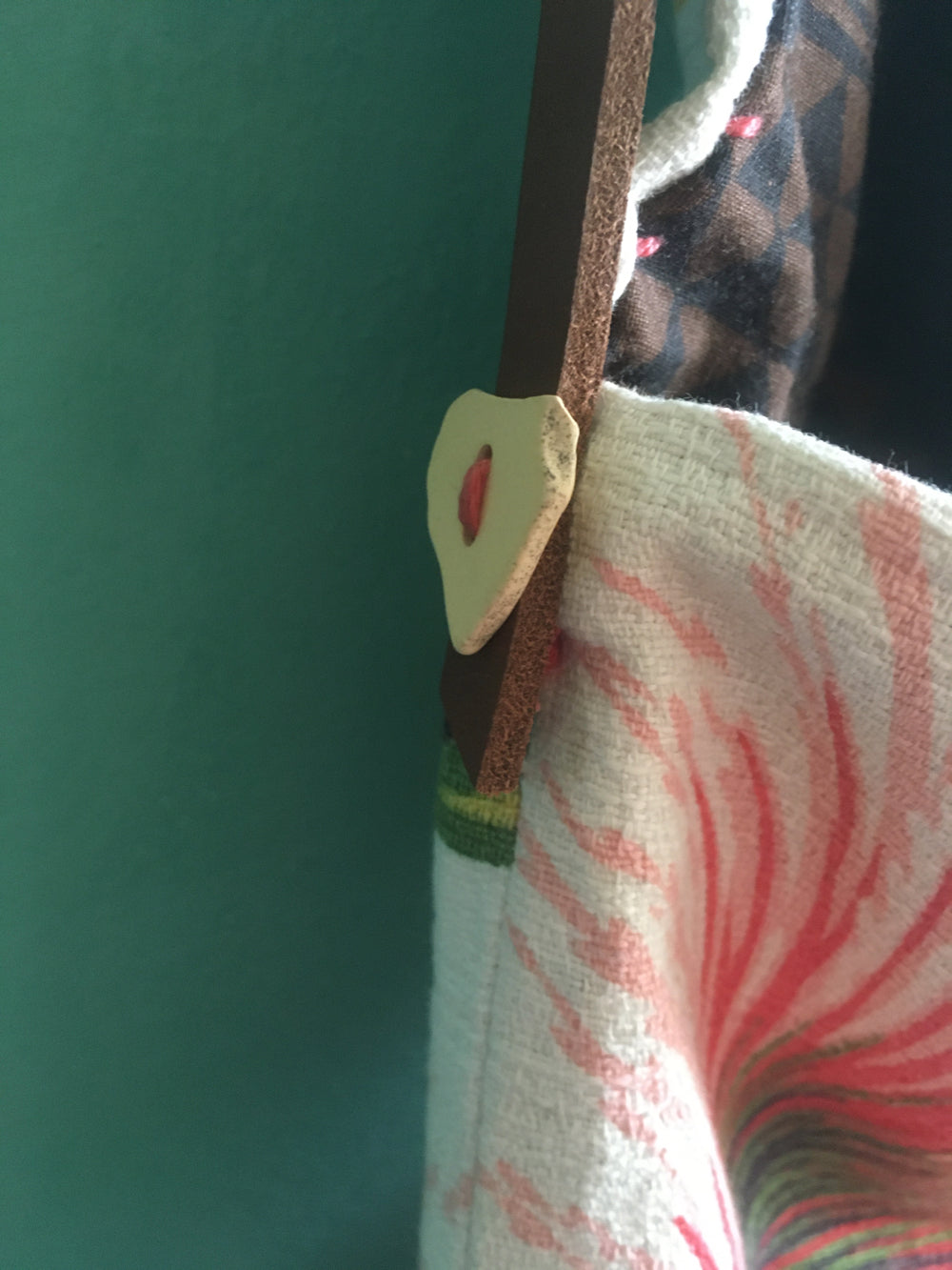 Tropical style banana leaf shoulder bag with upcycled materials.