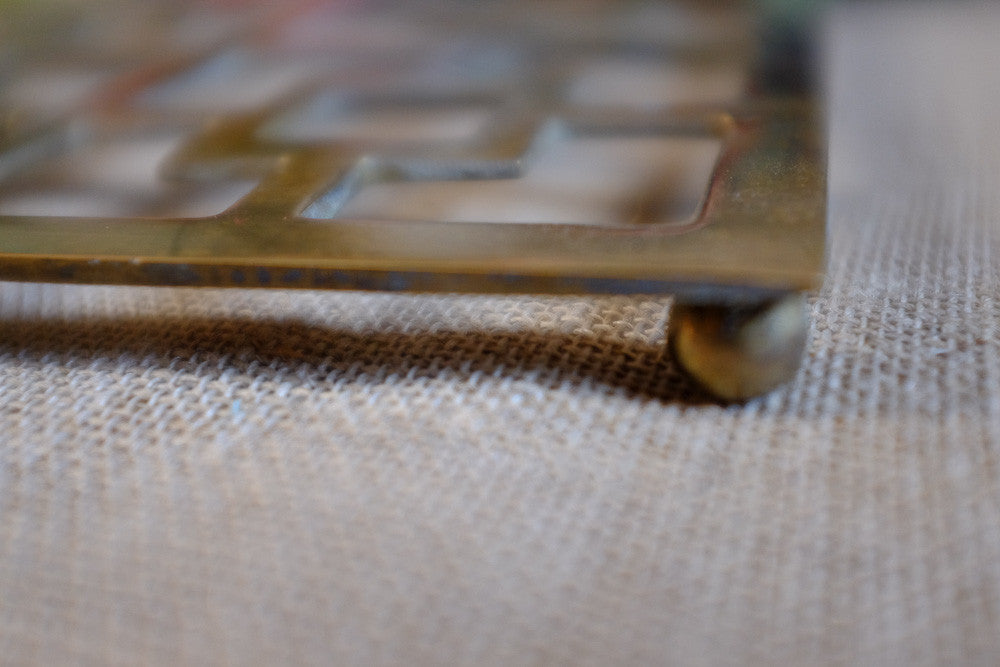 Mid-century Asian-style brass trivet