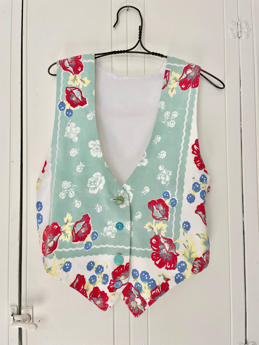 Vintage floral vest made from 1940s curtain fabric.