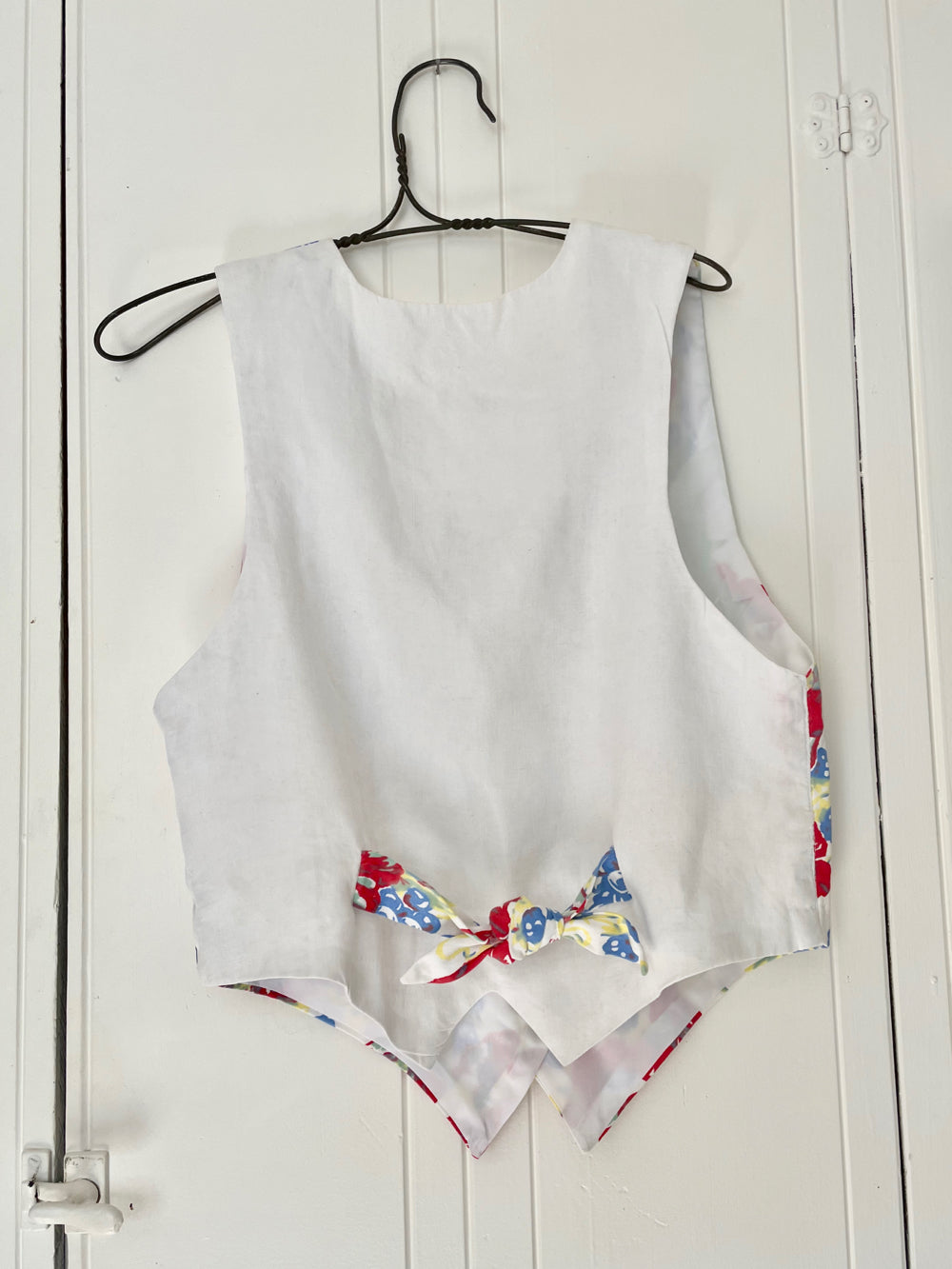 Vintage floral vest made from 1940s curtain fabric.