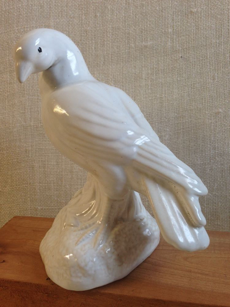 Vintage ceramic dove with peaceful and serene design