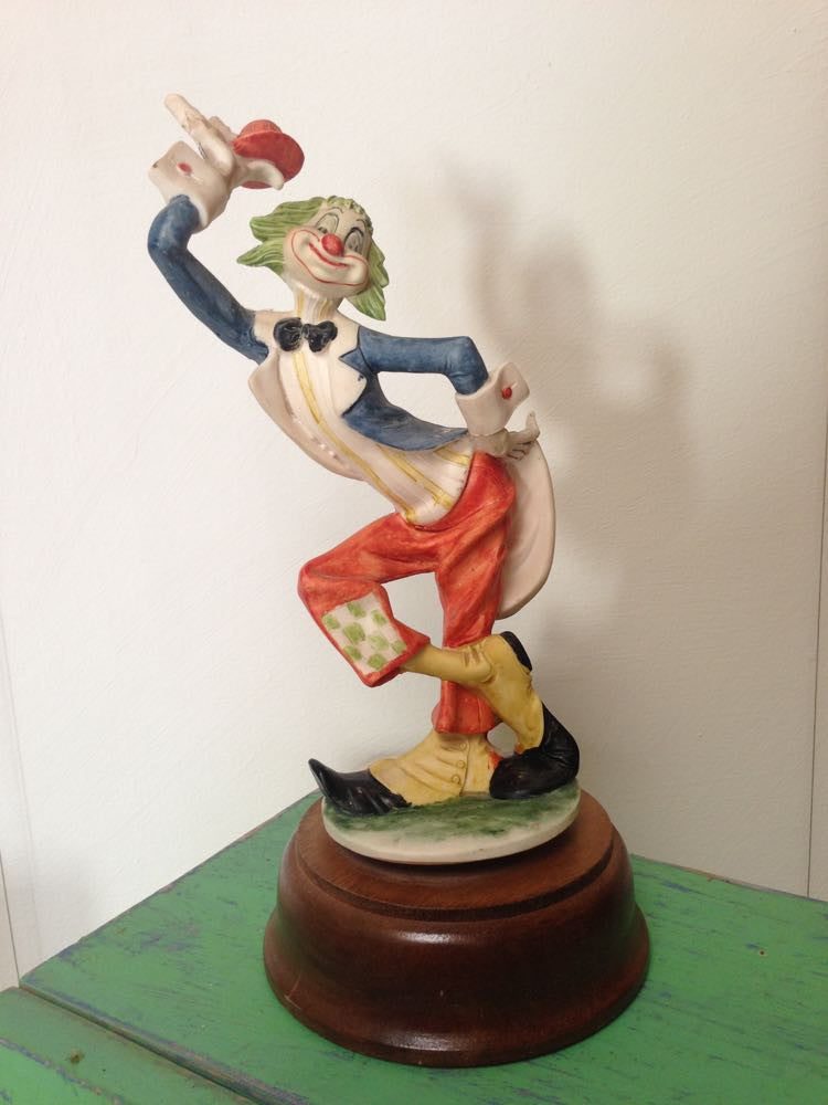 Vintage ceramic hat tipping clown figurine