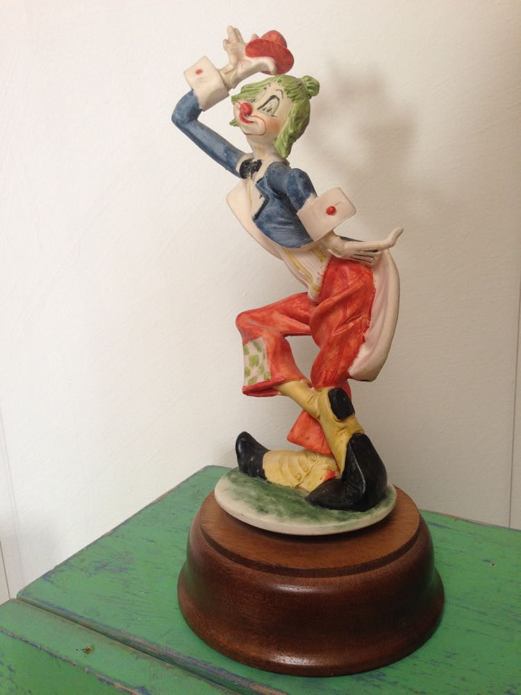 Vintage ceramic hat tipping clown figurine