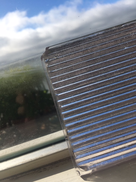 Vintage Chicago glass street tiles with architectural salvage.