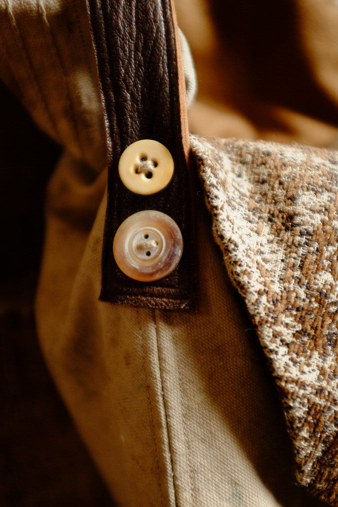 Upcycled drop cloth tablet bag with handmade details.