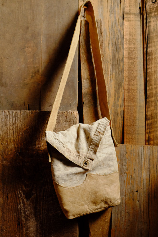 Upcycled drop cloth tablet bag with handmade details.