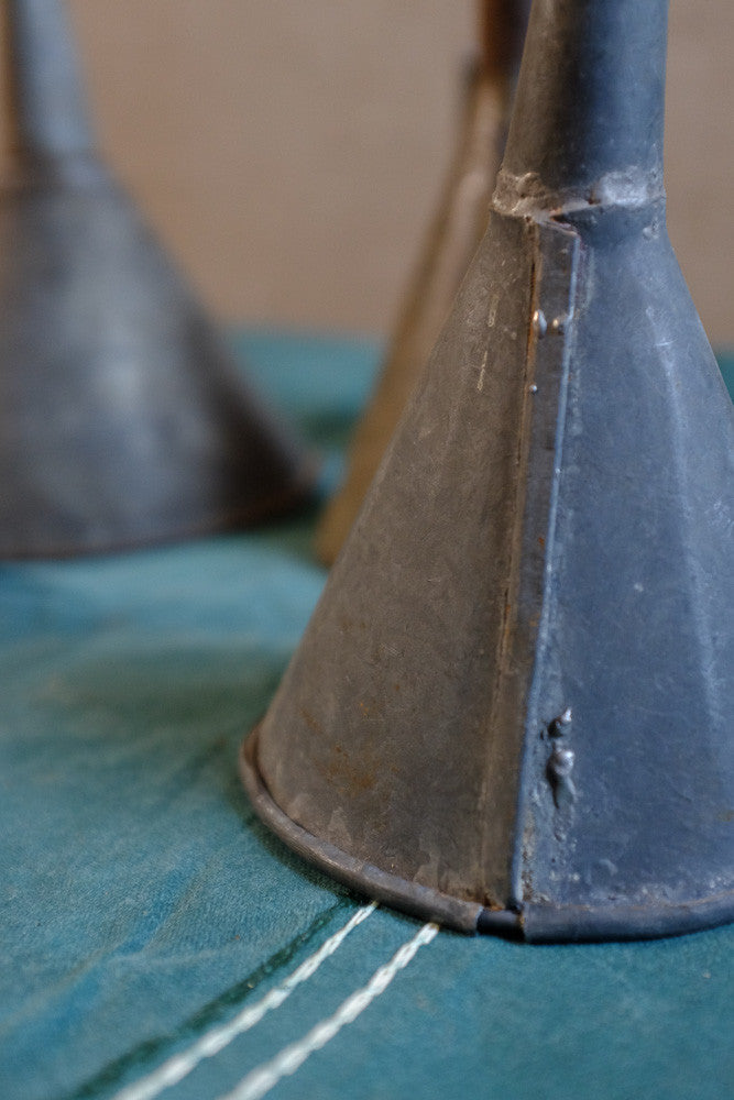 Vintage metal funnels