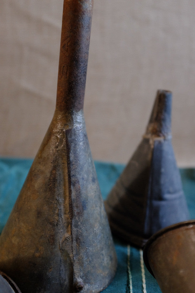 Vintage metal funnels