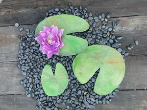 Hand sewn and painted  water lily leaves and flower on stones
