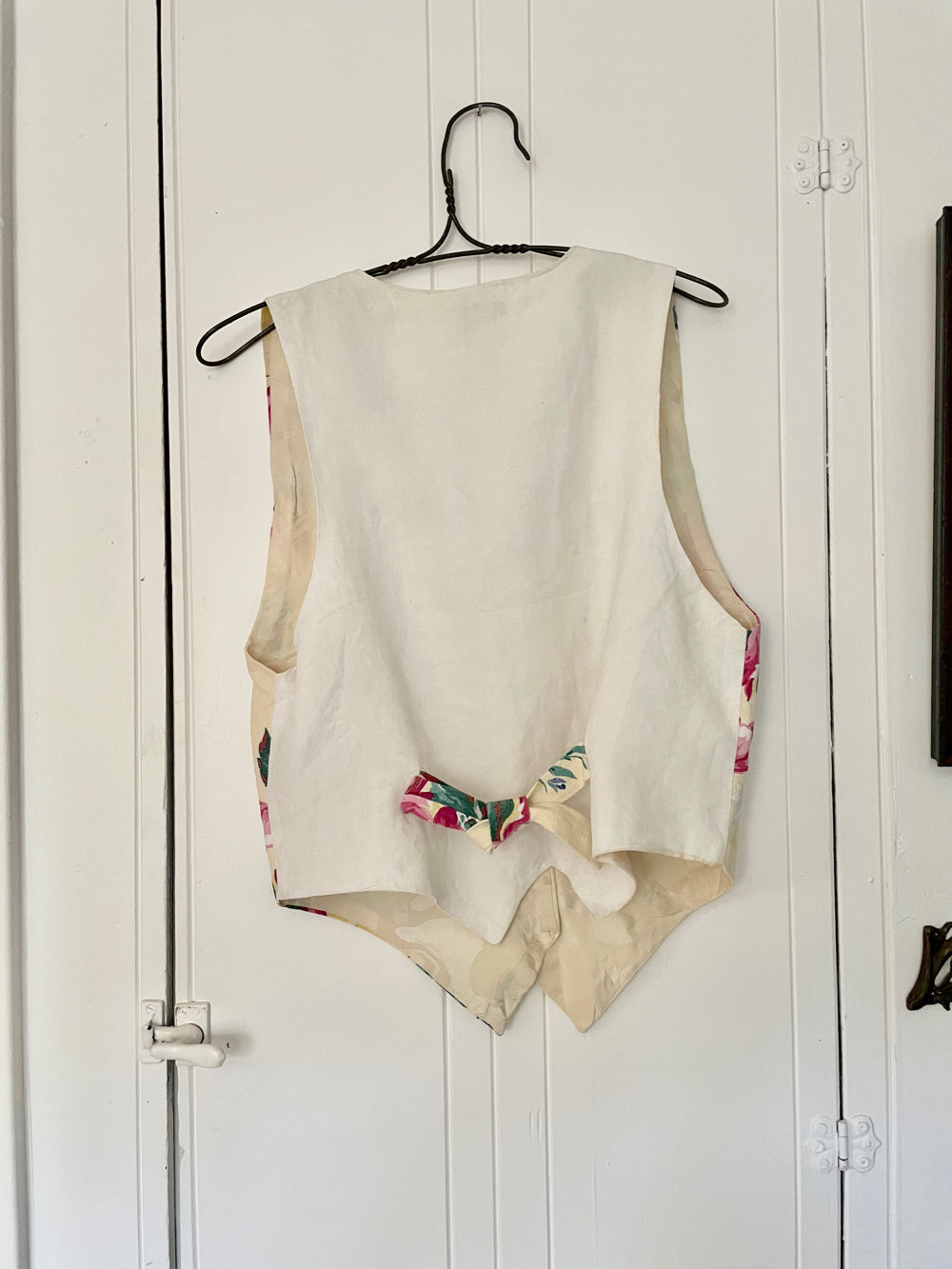 One-of-a-kind floral vest made from vintage 1940s drapery fabric.