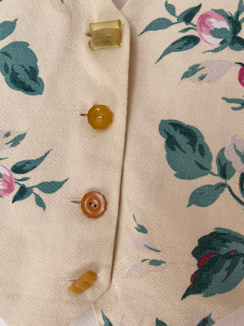 One-of-a-kind floral vest made from vintage 1940s drapery fabric.