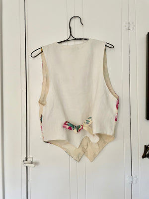 One-of-a-kind floral vest made from vintage 1940s drapery fabric.