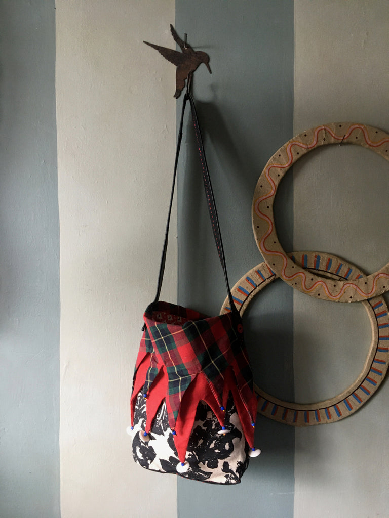 Ms. Hatter's harlequin bag