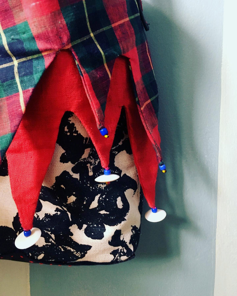 Ms. Hatter's harlequin bag