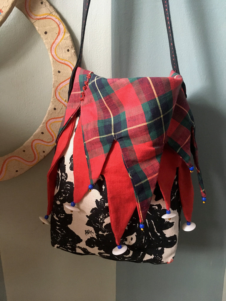 Ms. Hatter's harlequin bag