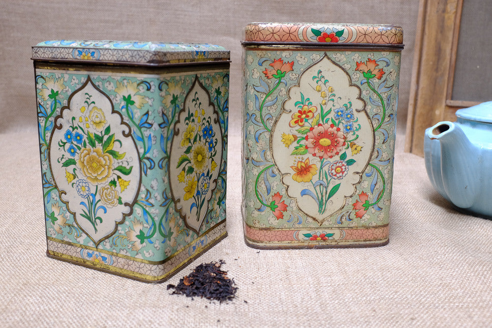 Vintage tea tins with floral patterns