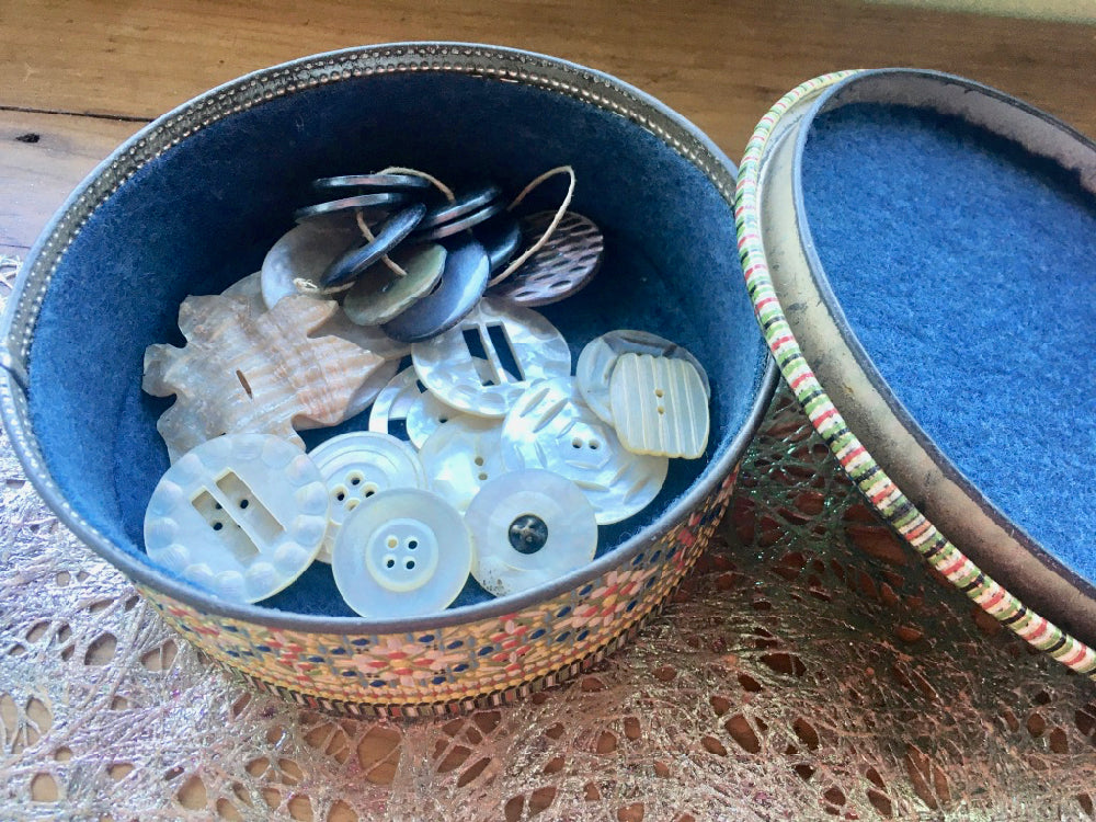 lined round tea tin