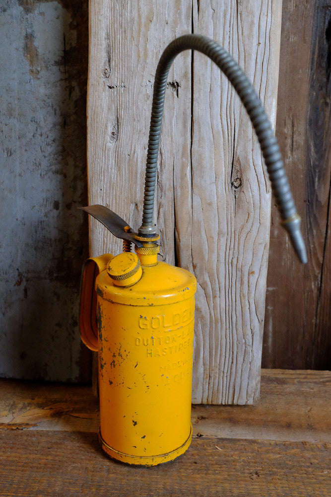 vintage yellow oil can - Antares Furnishings